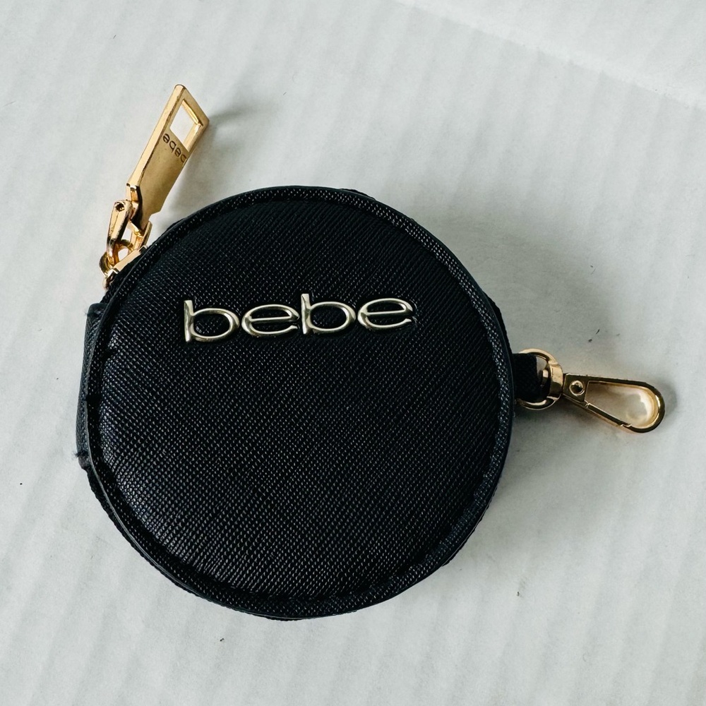 BEBE Clip-On Coin Purse; Black with Gold hardware.